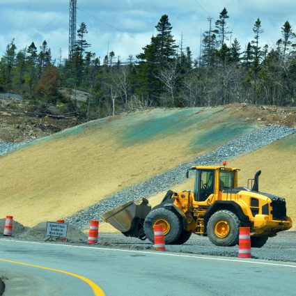 Seeding with hydro mulch is an effective erosion control method for slopes and embankments.